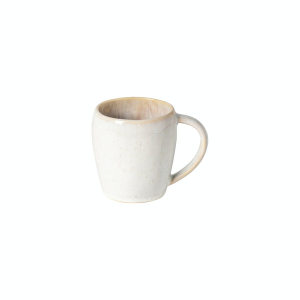 Simple ceramic mug with speckled glaze finish on white background.