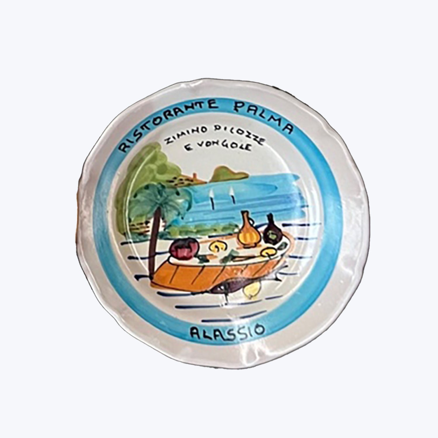 Decorative plate with coastal dining scene from Ristorante Palma, Alassio.