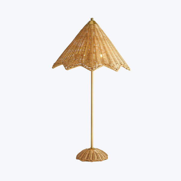 Golden floor lamp with umbrella-inspired shade adds beachy charm