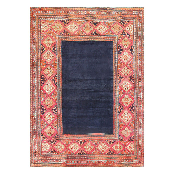 Traditional navy blue rug with intricate geometric and floral designs.