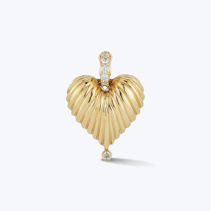Gold heart pendant with diamond accents, elegant and polished design.