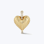 Gold heart pendant with diamond accents, elegant and polished design.