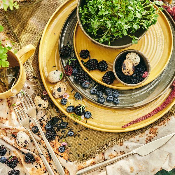 An artistically arranged food setting with a springtime garden aesthetic.
