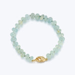 Handmade aquamarine beaded bracelet with gold lobster claw clasp.