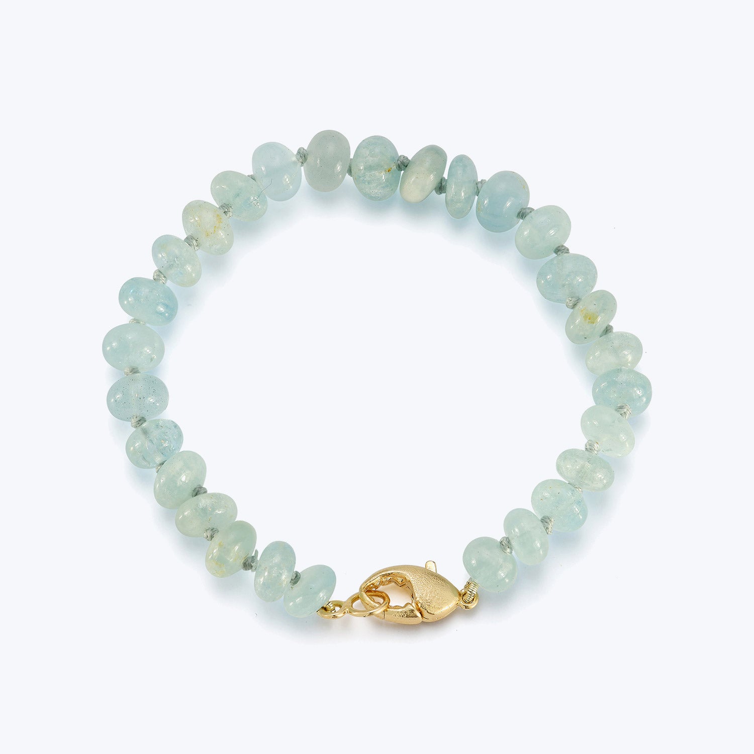 Handmade aquamarine beaded bracelet with gold lobster claw clasp.