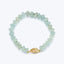 Handmade aquamarine beaded bracelet with gold lobster claw clasp.